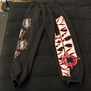 Vintage SB Studios Dynamic Black Sweatpants with Red Graphics